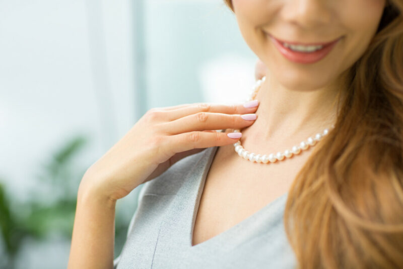 Woman wearing pearls