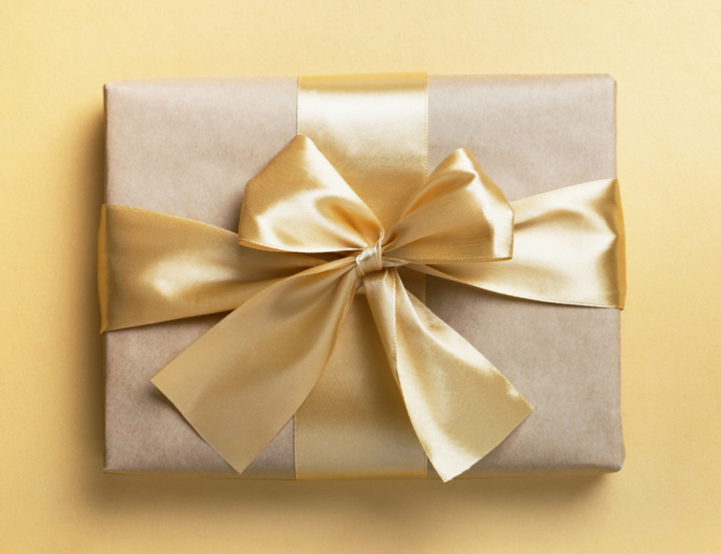 A jewelry box is wrapped to perfection signifying the “do’s” of the do’s and don’ts of gift-giving jewelry